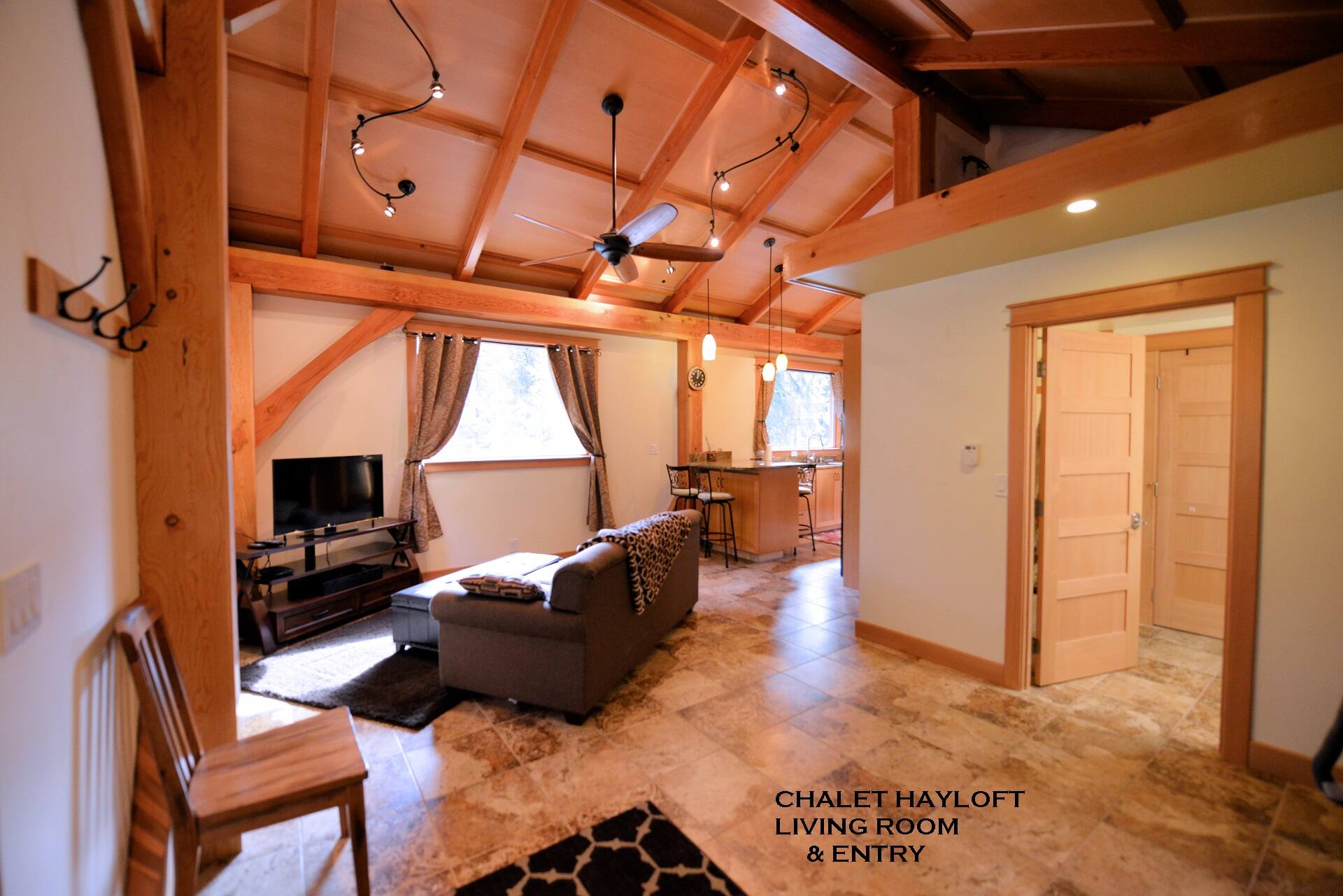 Carriage House “Hayloft” Rusticly Elegant Cottage