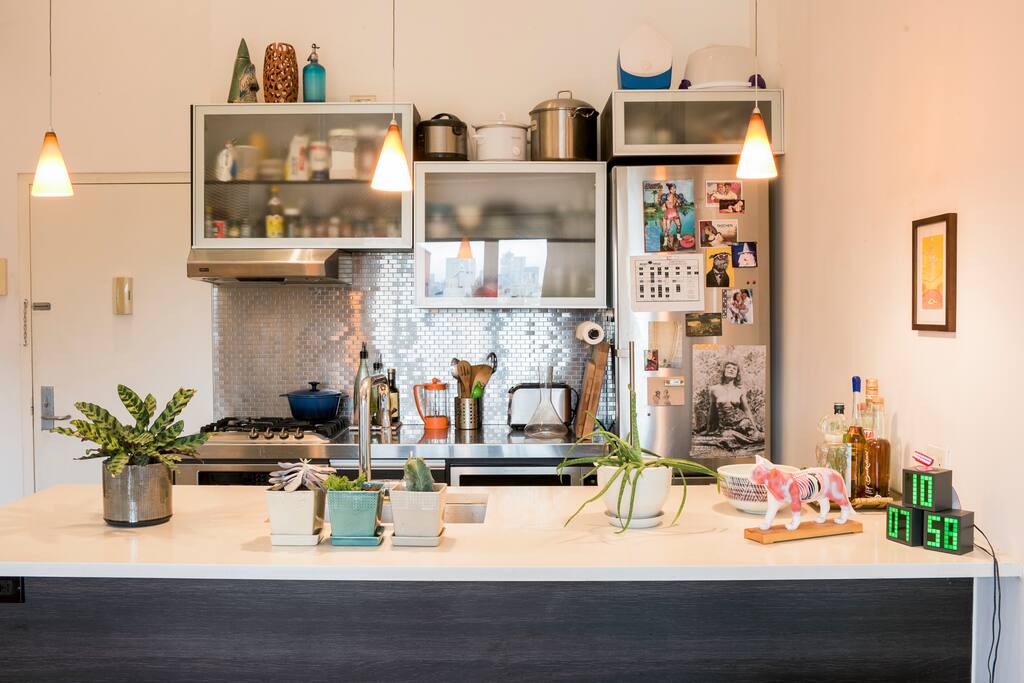 Fully equipped kitchen with modern appliances.