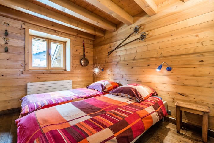 the 1st bedroom, 2 beds, linens provided + linen, closet/wardrobe