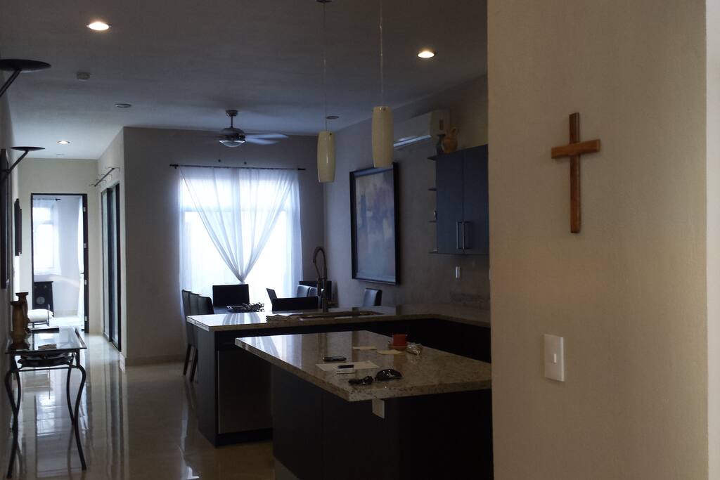 Very Spacious with an Island and a view to the patio and mini pool