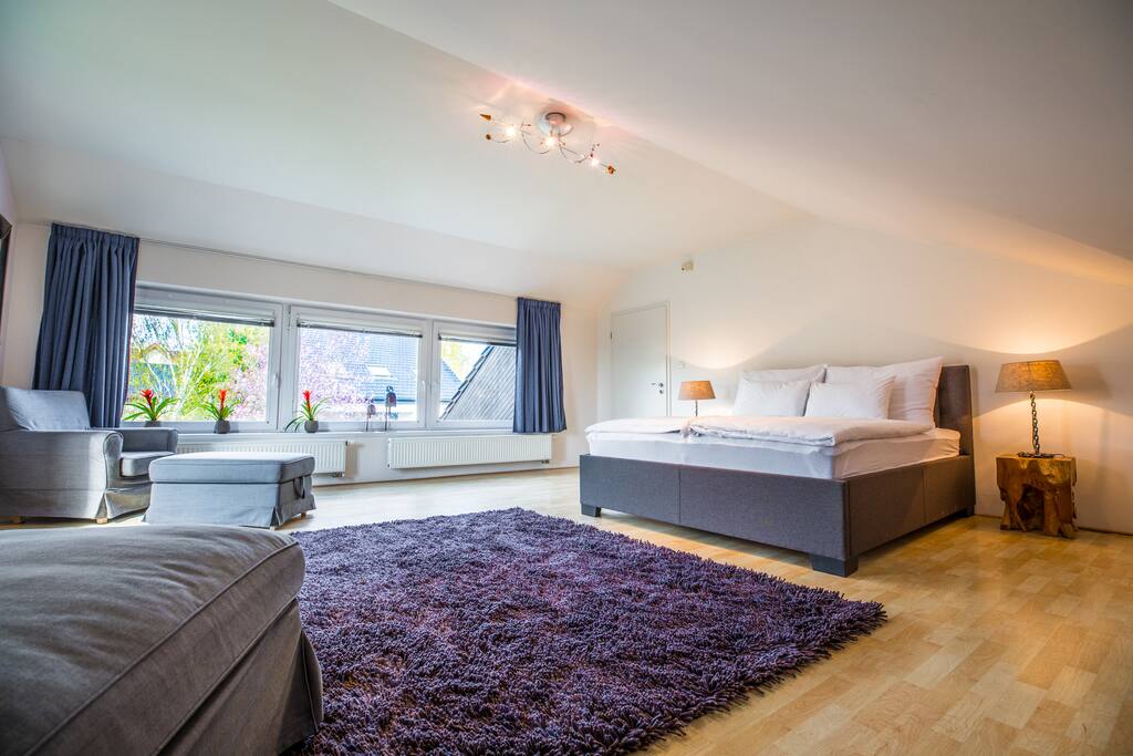 There are a seating and tailor-made curtains in every Bedroom