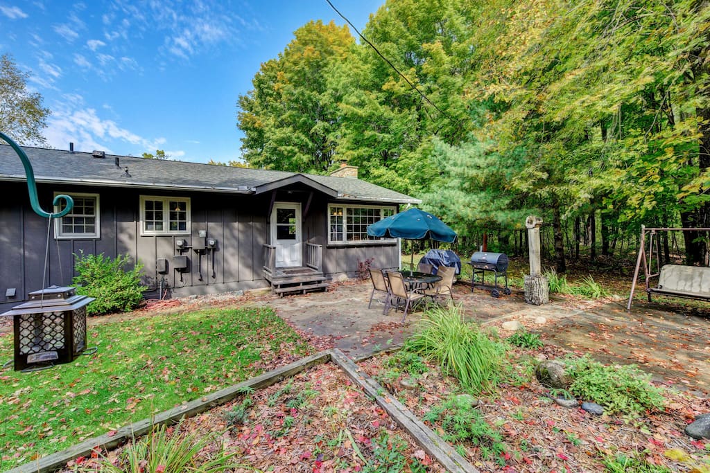 With a patio, fire pit and woodland setting, this is an outdoor lover’s dream.