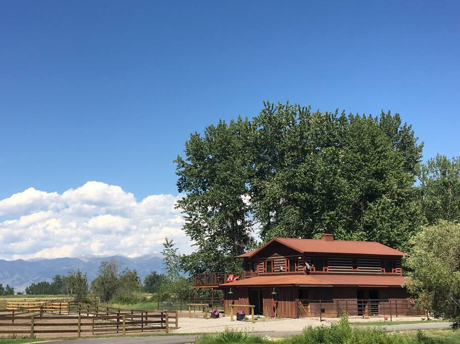 The BarnHouse Apartment in the summer. While boarded in the winter, the horses share the bottom floor in the summer.