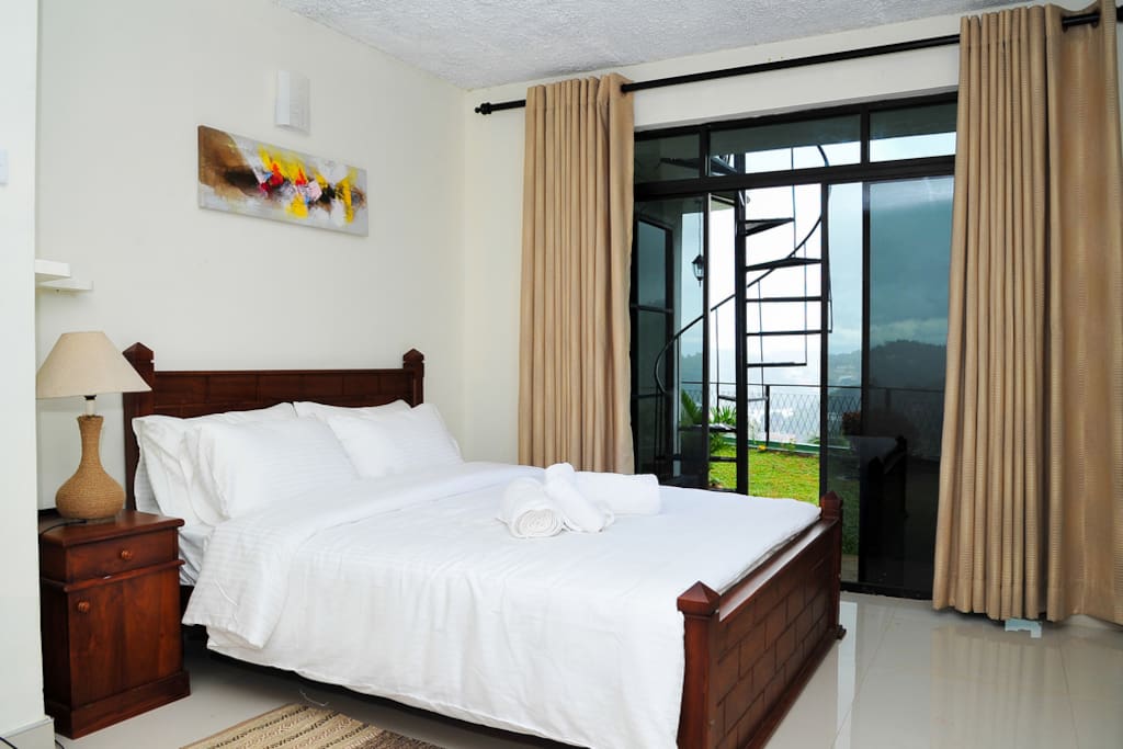 Room with view facing the kandy city and surrounding hills.
