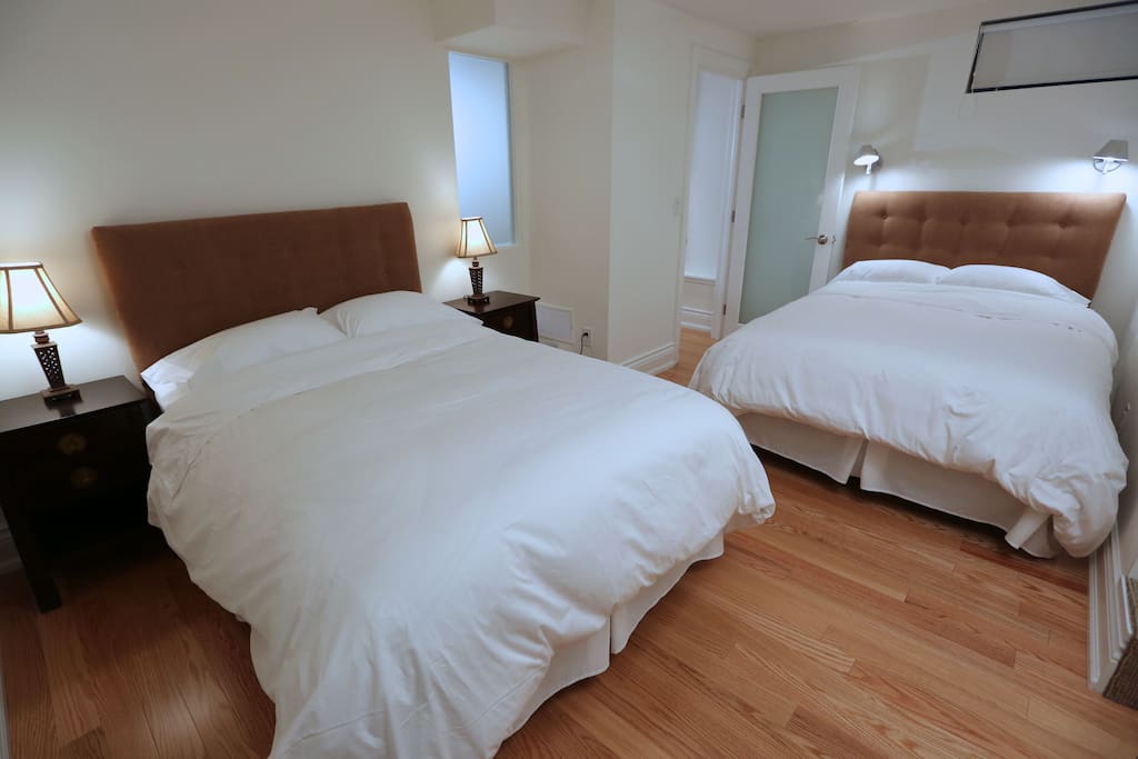 Bedroom #2 with 2 double beds.