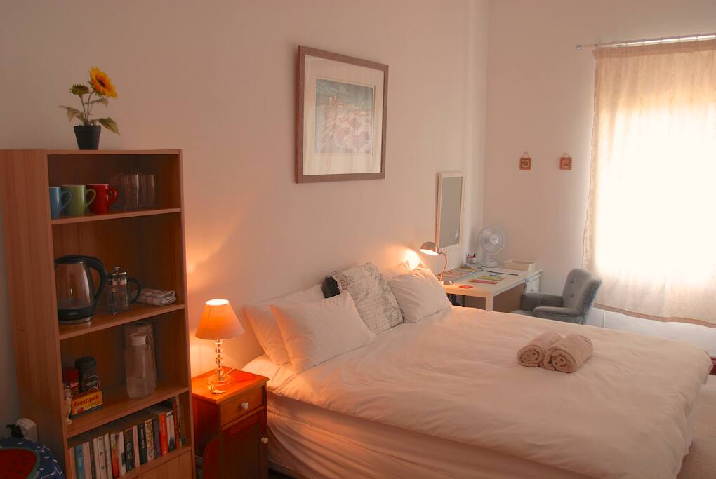 King size bed in a very comfortable room