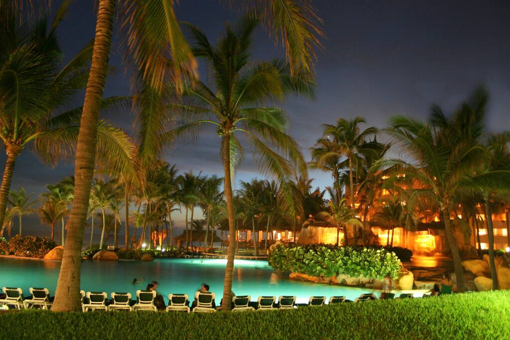 The resort pool after nightfall.