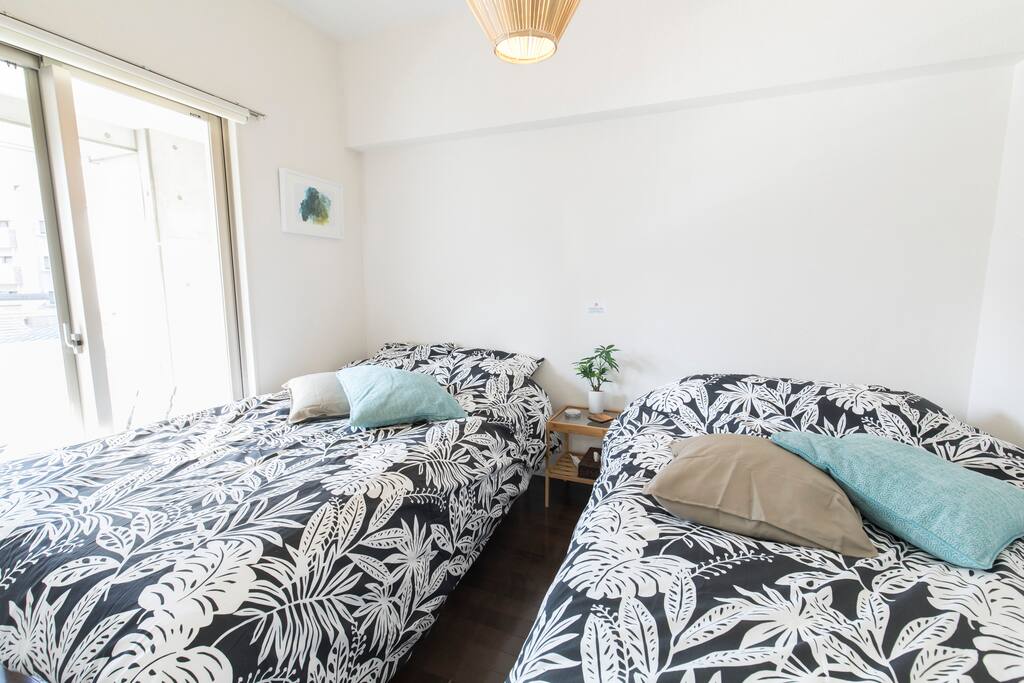 Semi double beds in the bedroom with privacy partitions