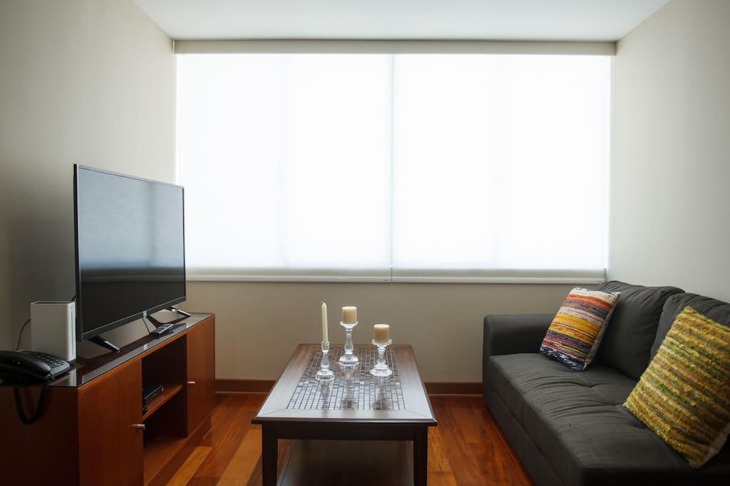 Sala con TV con cable, WiFi y teléfono.