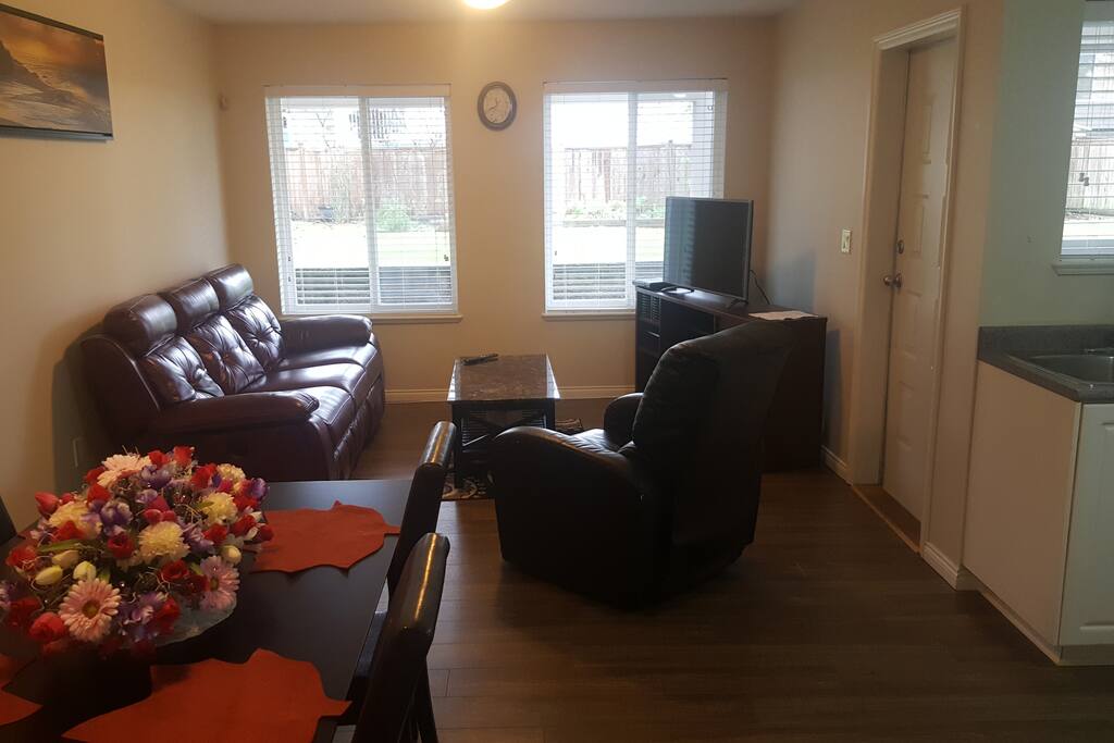 Fully furnished living space and dining area.