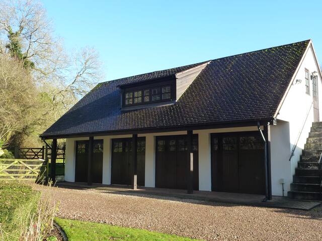 Entrance to the loft apartment is at the top of the stairs.