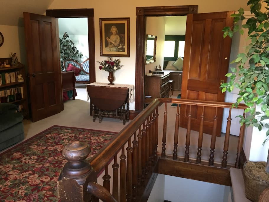 This shows the dropleaf table in the sitting room and doorways to both bedrooms.