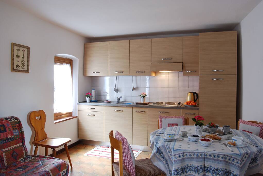 cucina con divano letto