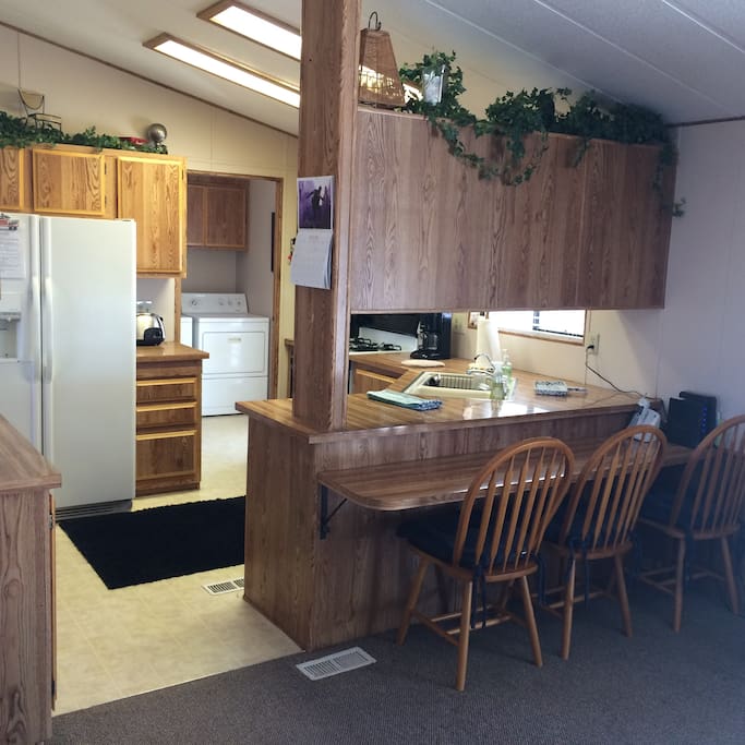 fully equipped open kitchen, brand new fridge, new stove