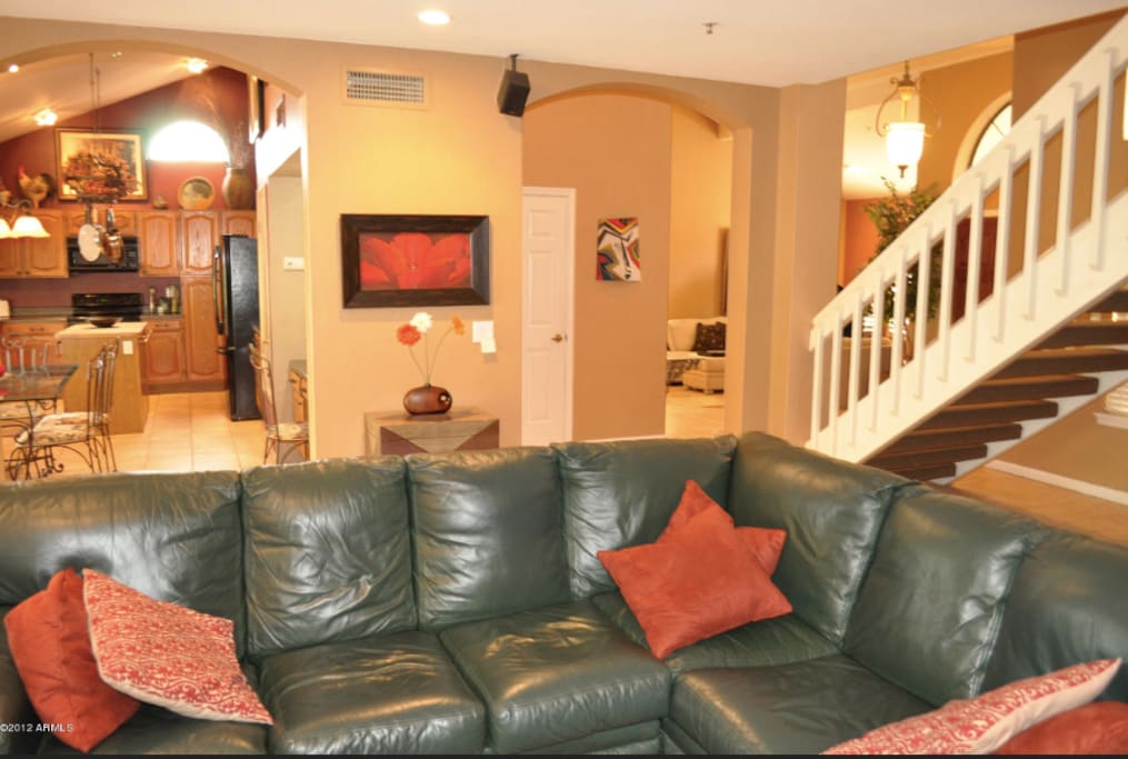 Very comfortable family room with built in TV unit on adjacent wall