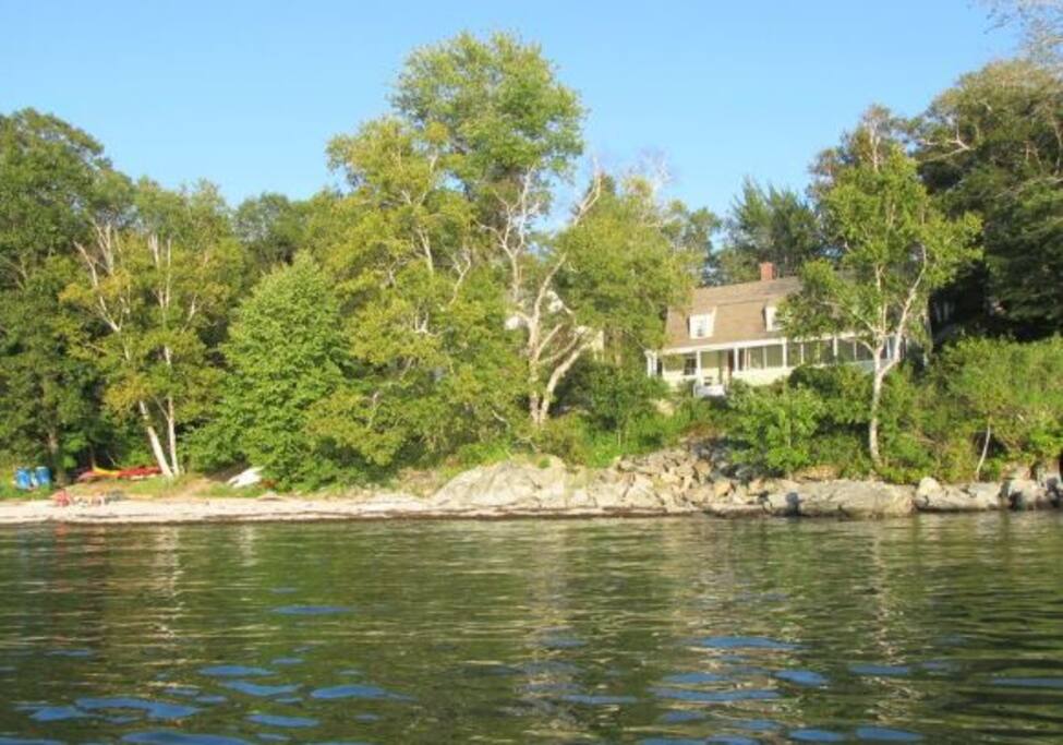 View from water. Beach on left.