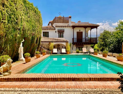 Carmen with a large pool and views