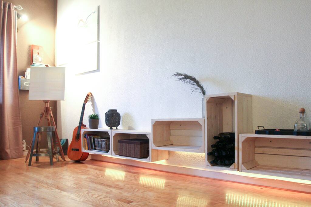 Vintage shelfs with lights in living room.