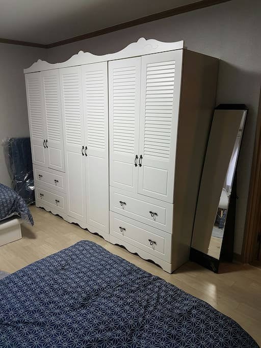 two wardrobe spaces on each side,