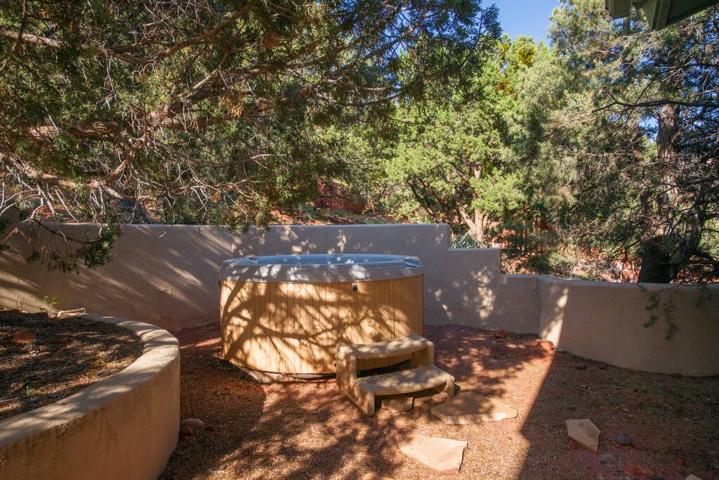 Hot tub just off back patio.