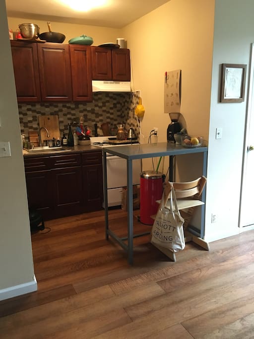The kitchen is cozy and is easy to hang out with people while you cook