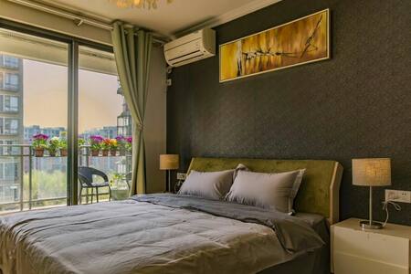奥体中心地铁旁CBD核心区域鲜花景观阳台主卧 - Nanjing - Departamento