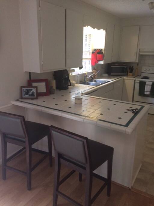 Kitchen and breakfast bar