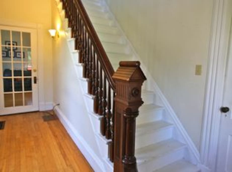 The entry and stairwell to second floor