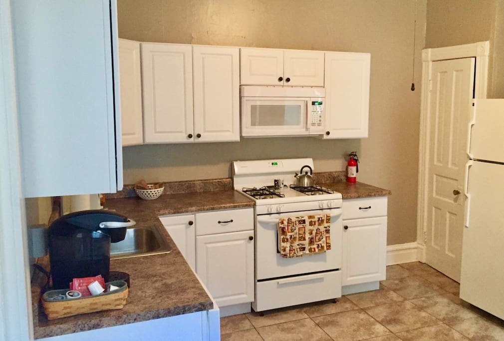 Kitchen with Keurig and coffee included; dishwasher, refrigerator, and microwave equipped