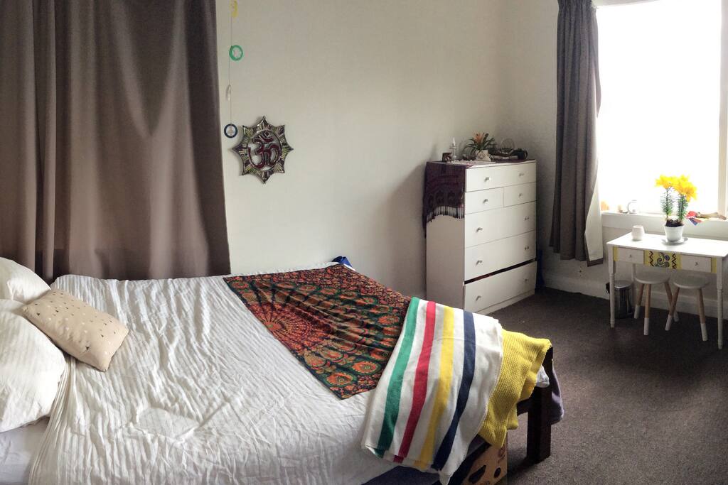 The room! :) we are getting ready to travel in Feb. There will be empty drawers for you to use, an art table right in front of the window, and some basic amenities (hair dryer, shampoo, soap etc.)