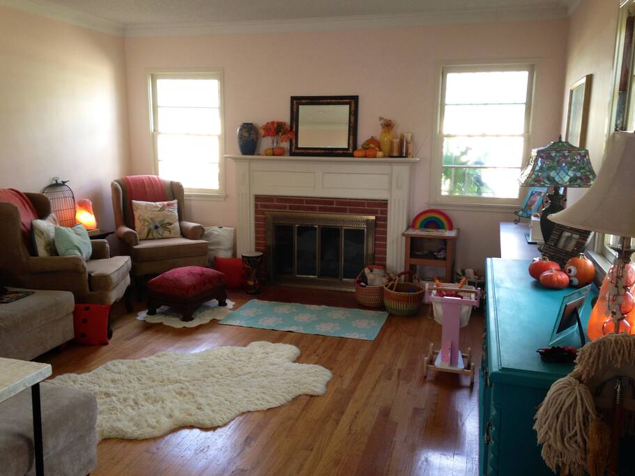 Beautiful large living room with tons of seating and working fireplace.