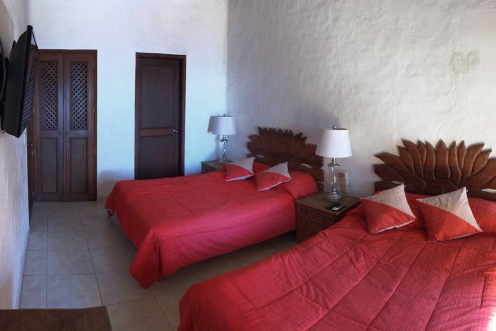 Habitación con 2 camas matrimoniales