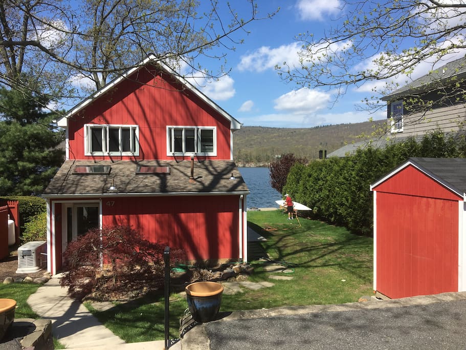 View of the house from the road and parking area.