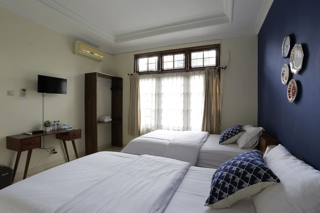 Our Blue twin bed room has a unique ambience to satisfy your needs to unwind.
