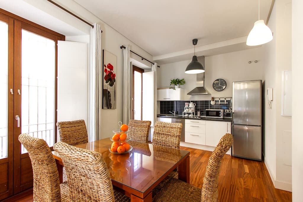 The dining space and the kitchen.