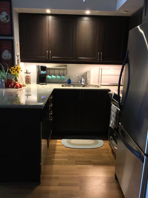 Kitchen with granite countertops.