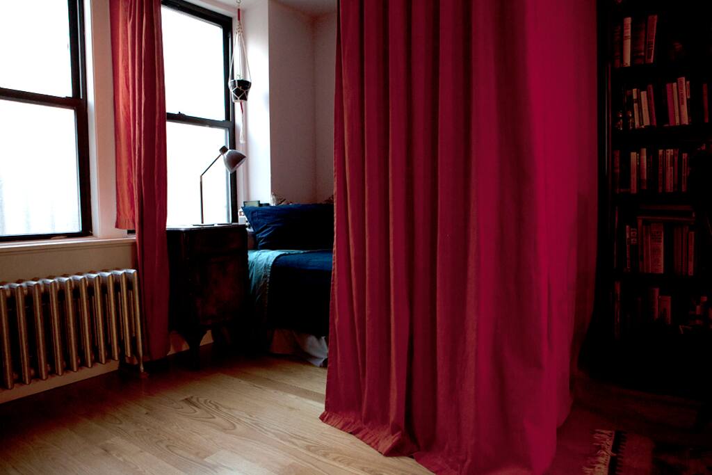 Privacy curtain and plenty of books for you to read.