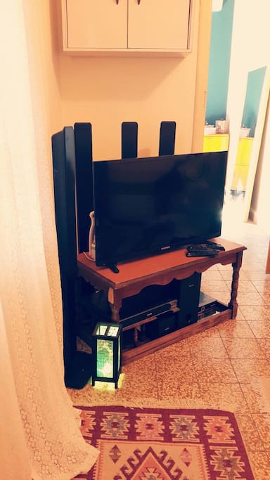 TV set with satellite, DVD player and surround sound system with new DVD releases