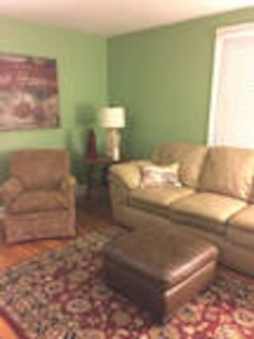 Living Room 1 with oversized leather couch.