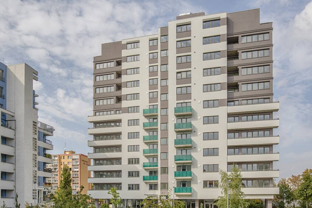 The flat is located in a fresh new building.