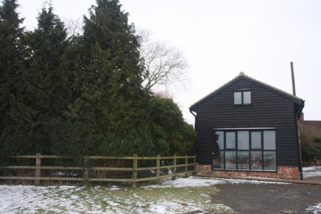 The front of the Granary, with large windows and uninhibited views across the valley