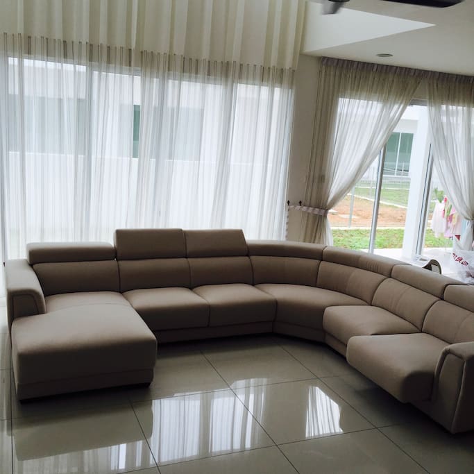 Living hall with massive designer sofa