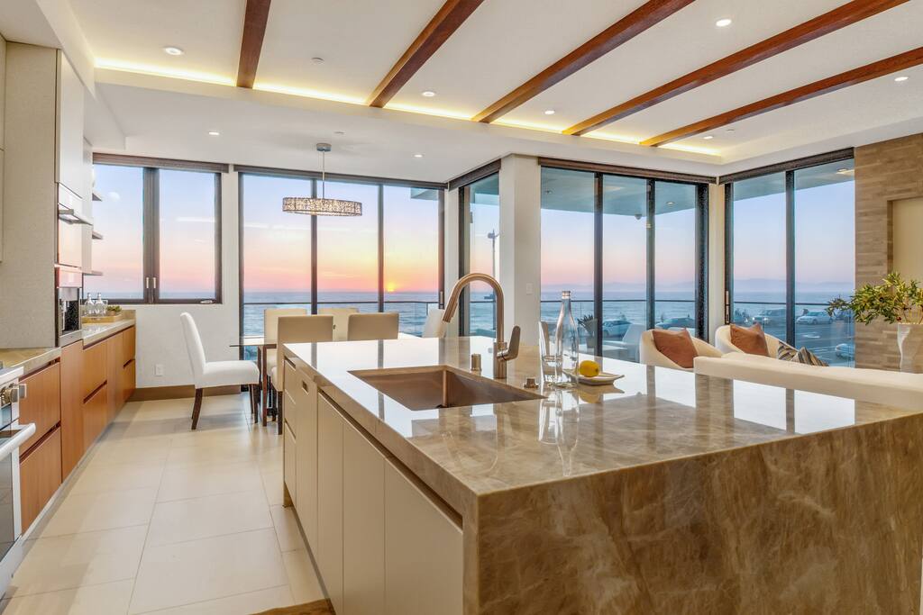 Top of the line kitchen with Miele appliances - steam oven, range, coffee machine, wine cooler, dishwasher, ec.