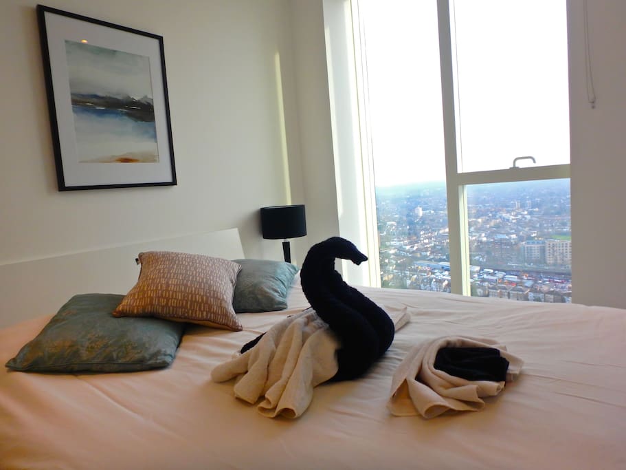 Master bedroom with TV, en-suite and great views across London