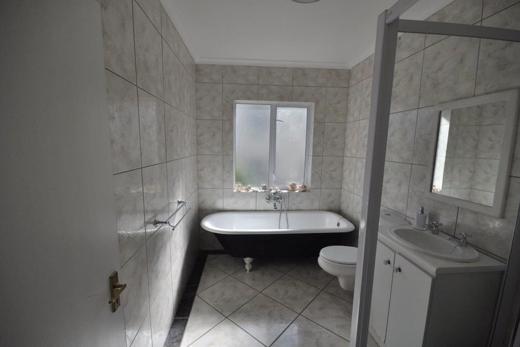 Victorian bath and separate shower downstairs