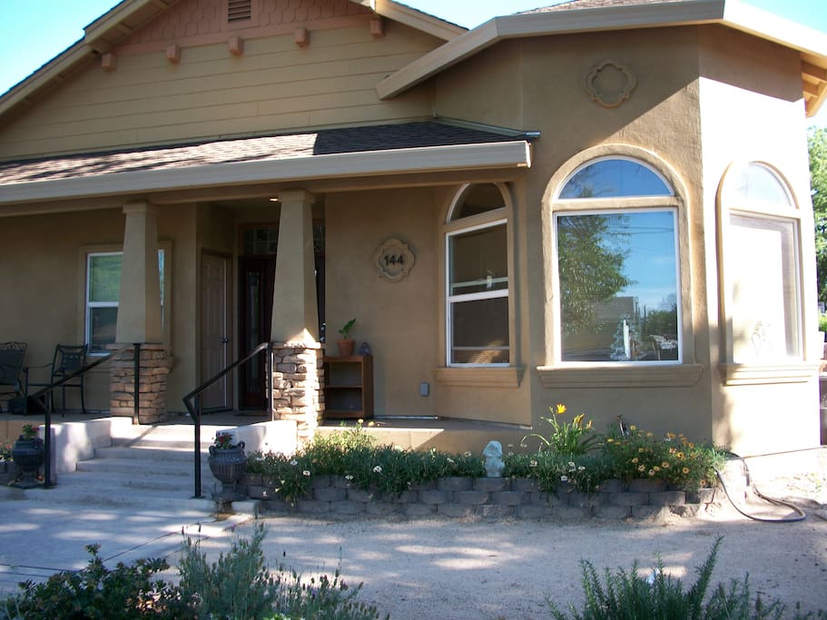 front of house - studio in back by pool fence