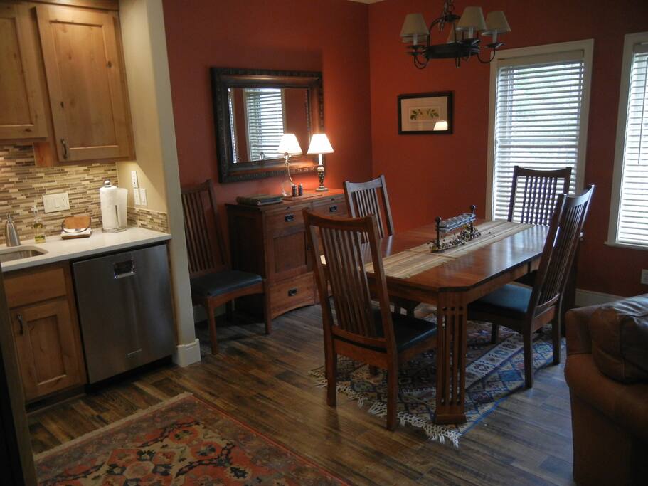 Full size mission style table is great work space or seats 8 for dinner, if needed.