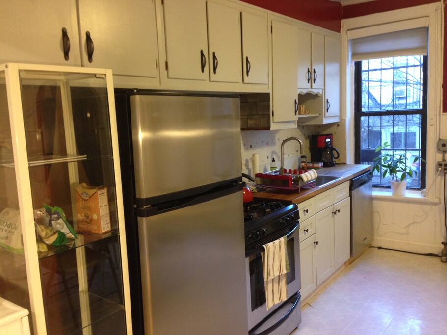 Fully stocked eat-in-kitchen.