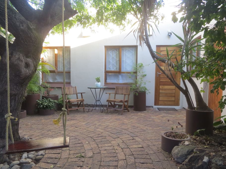The one-bedroom studio flatlet is separate from our family home with private access via a shared courtyard.