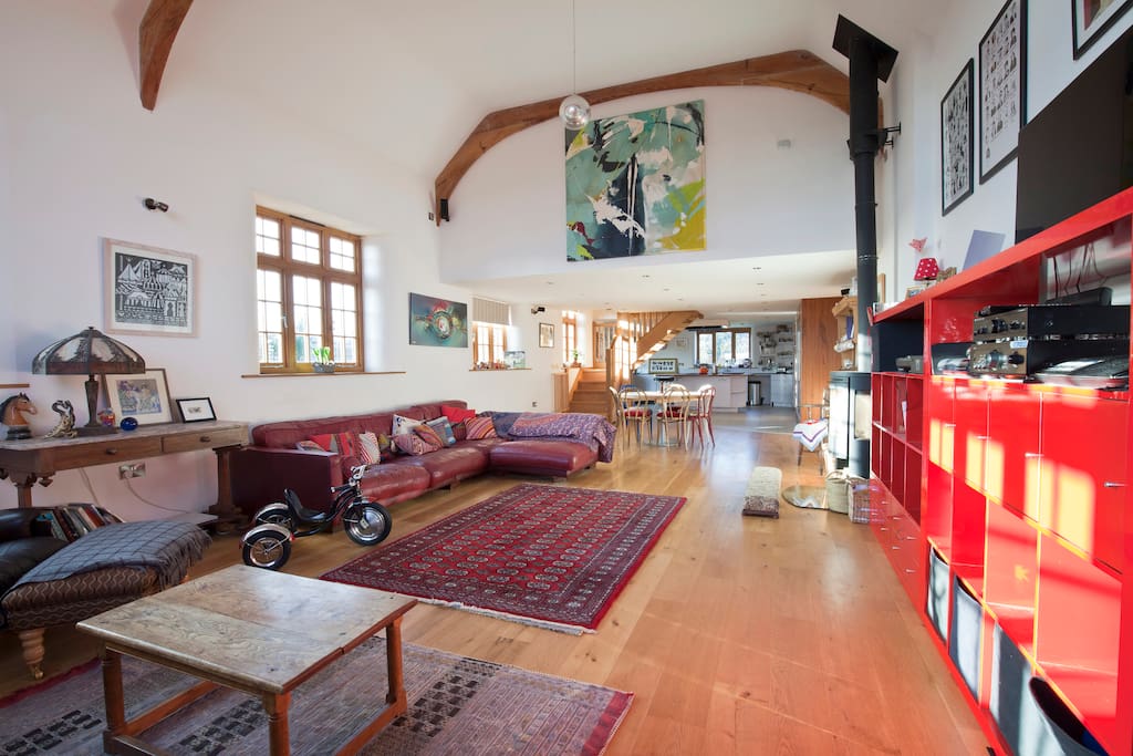 This is our main living area and it has a large window and double height ceiling